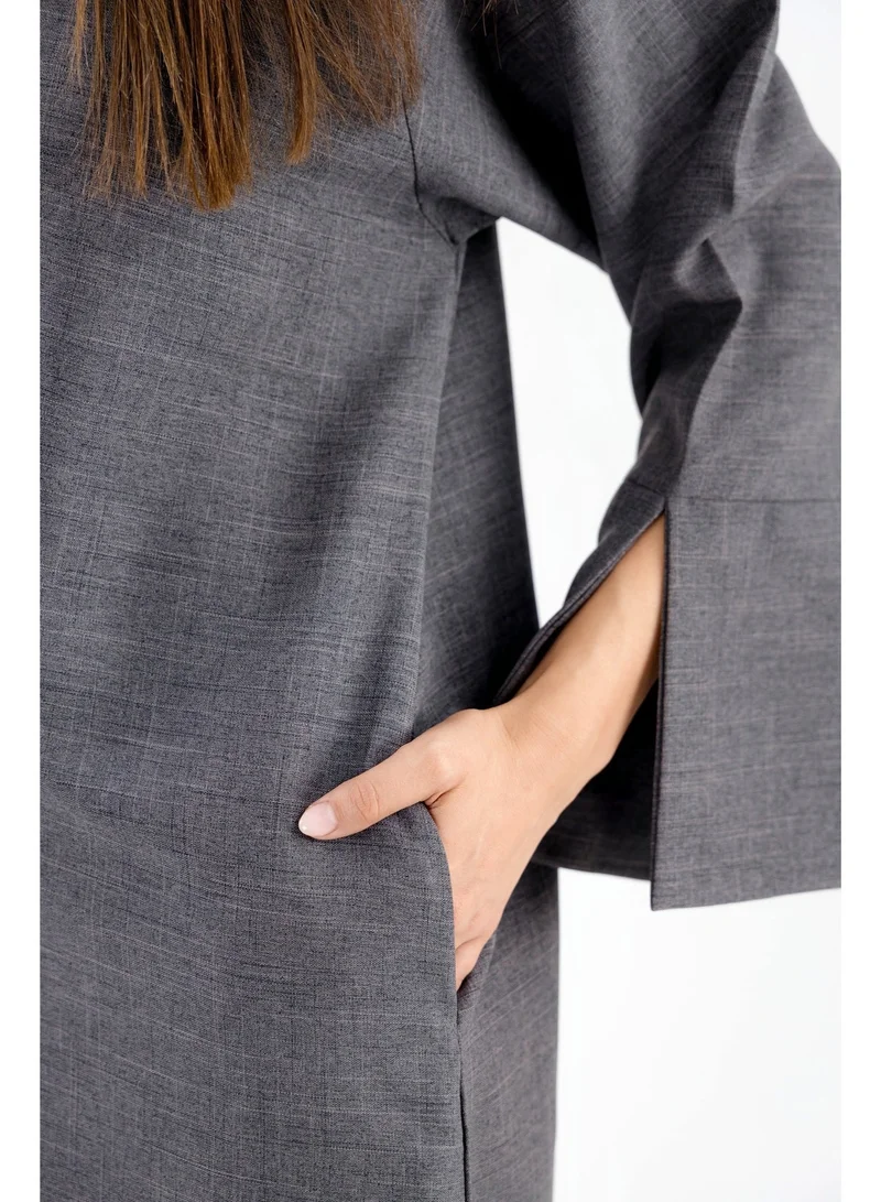 اوفيليا عباية نسائية من الكتان بجيوب - صناعة يدوية من الإمارات العربية المتحدة | تصميم أوفيليا الأصلي | ملابس محتشمةعباية نسائية من الكتان بجيوب - صناعة يدوية من الإمارات العربية المتحدة | تصميم أوفيليا الأصلي | ملابس محتشمة